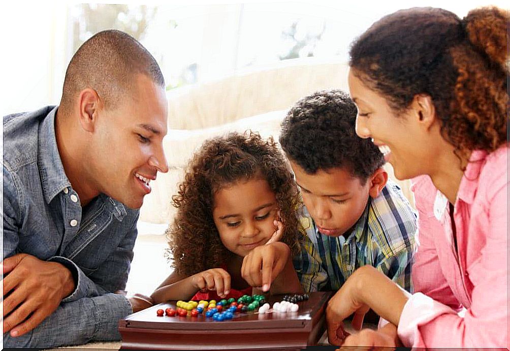 Family having fun with board games.