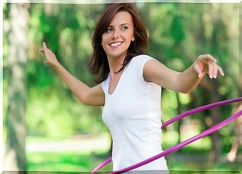 Woman exercising with a hoop