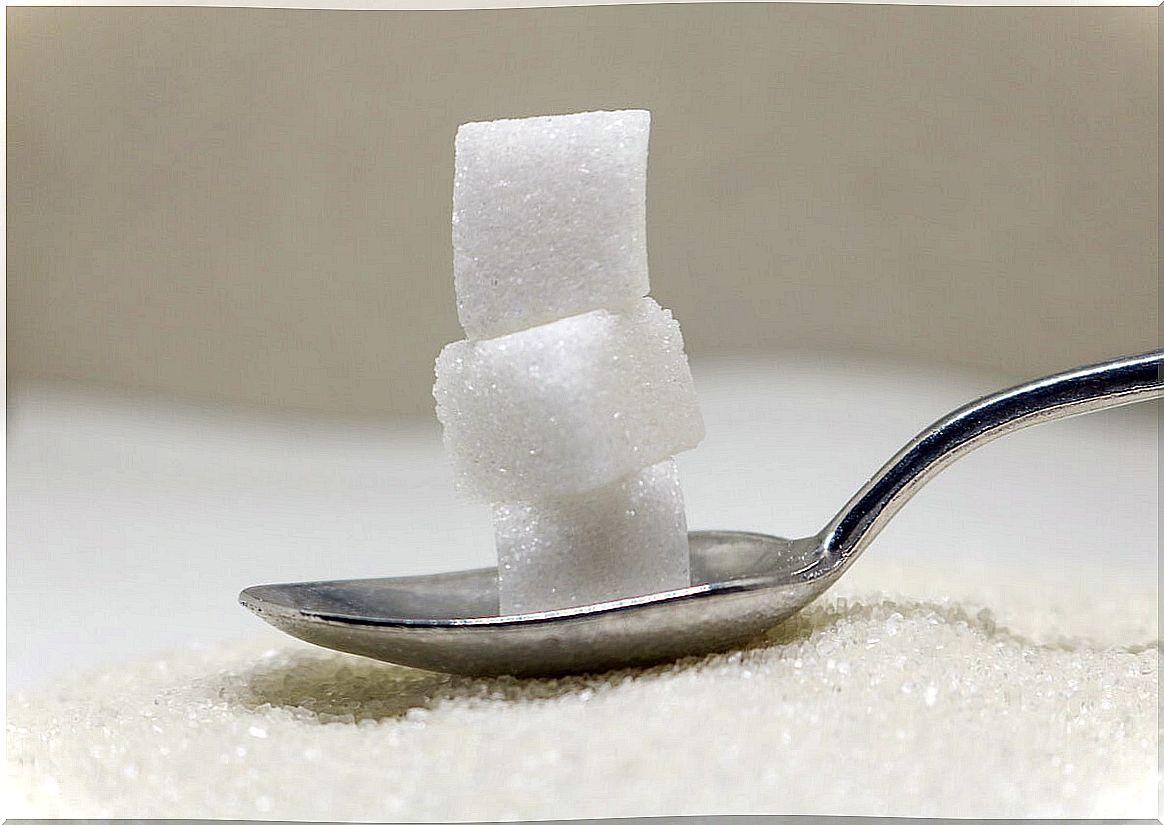 Refined sugar in spoon